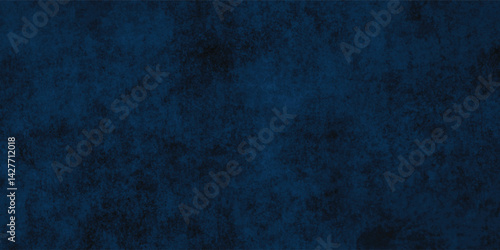 Rough dark blue wall with a visible canvas texture and subtle artistic details.
