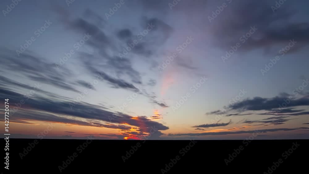 Dramatic sunset with clouds in a clear sky Dramatic sunset with clouds in a clear sky