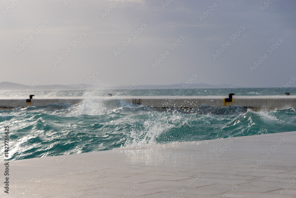 Strong Waves from the Jugo Wind Crash on the Promenade in Zadar, Croatia Strong Waves from the Jugo Wind Crash on the Promenade in Zadar, Croatia