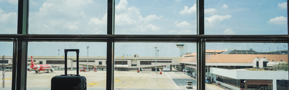 business concept with luggage and window in airport business concept with luggage and window in airport