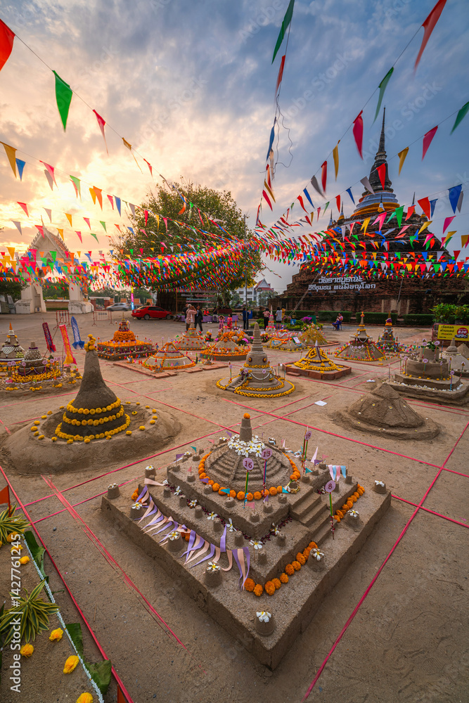 PHITSANULOK, THAILAND - April 10,2025: Thai people come to build the Sand Pagoda for return the sand to the temple on Songkran festival at Ratchaburana temple in Phitsanulok Thailand.