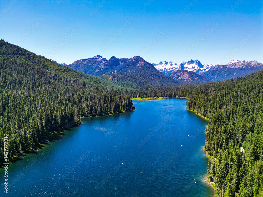 Cooper Lake in Washington. Scenic nature of popular hiking Cooper lake. Cooper lake with mountain landscape. Landscape of mountain and forest of Cooper lake. Nature landscape. Untouched wilderness Cooper Lake in Washington. Scenic nature of popular hiking Cooper lake. Cooper lake with mountain landscape. Landscape of mountain and forest of Cooper lake. Nature landscape. Untouched wilderness