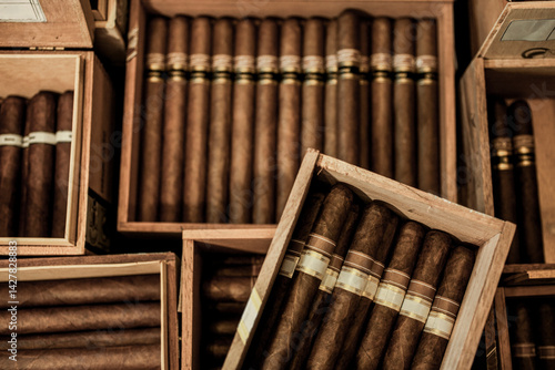 Slika na platnu Stacks of new cigars in wooden boxes piled up