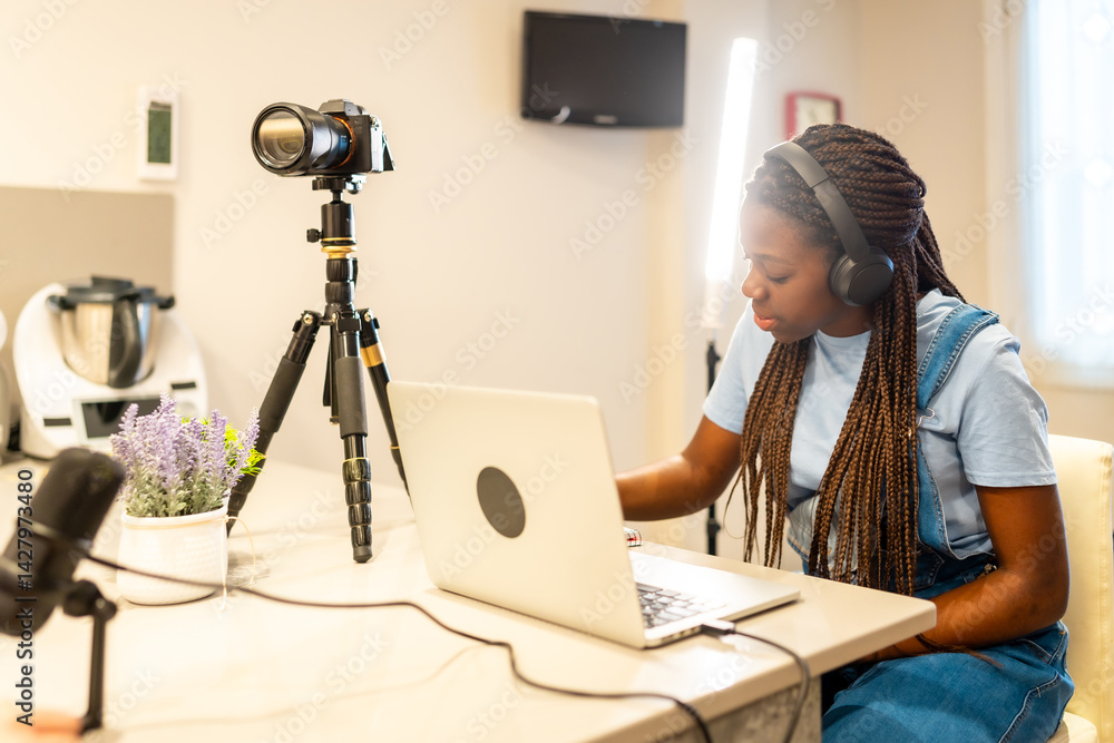 Teenager vlogger recording video content at home