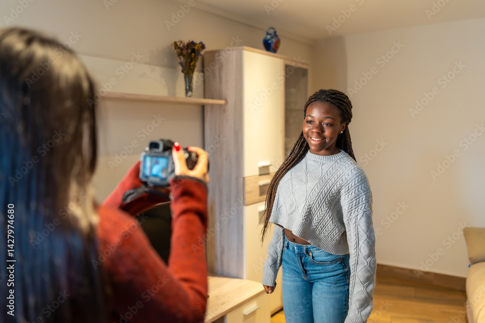 Teenage girls taking photos at home, friendship, photography, and fun