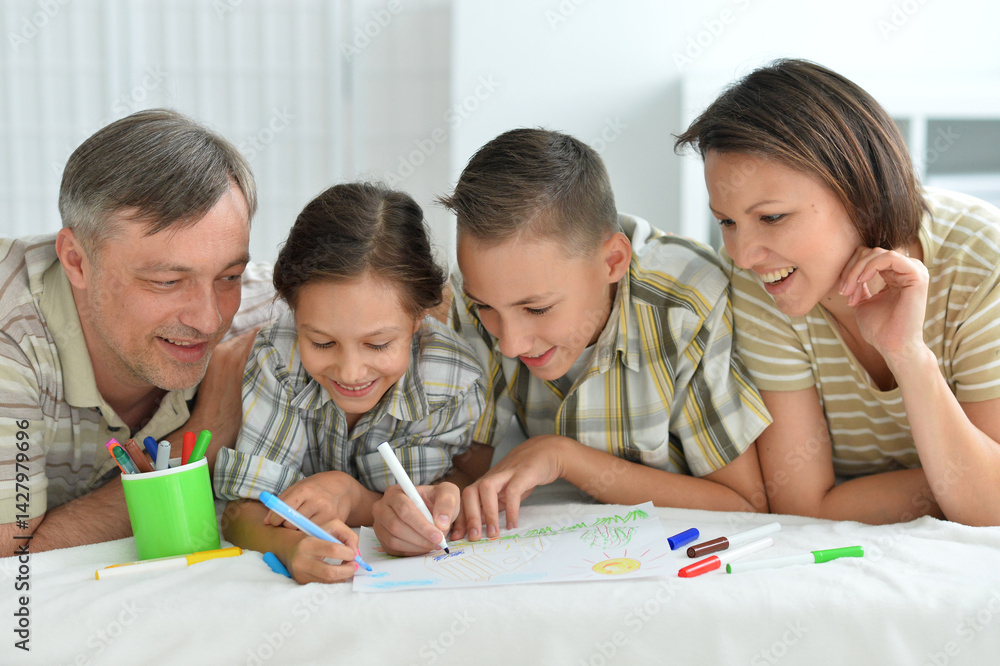 Family Drawing Together on the Floor