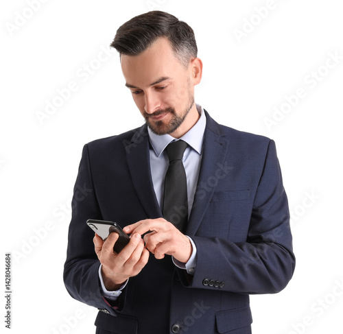 Handsome businessman using ...