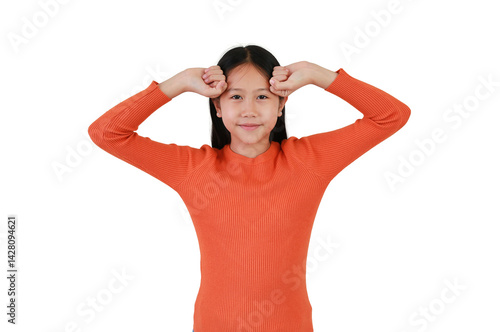 Obraz na płótnie Playful Asian girl child put both hands on forehead isolated on white studio background. w salonie