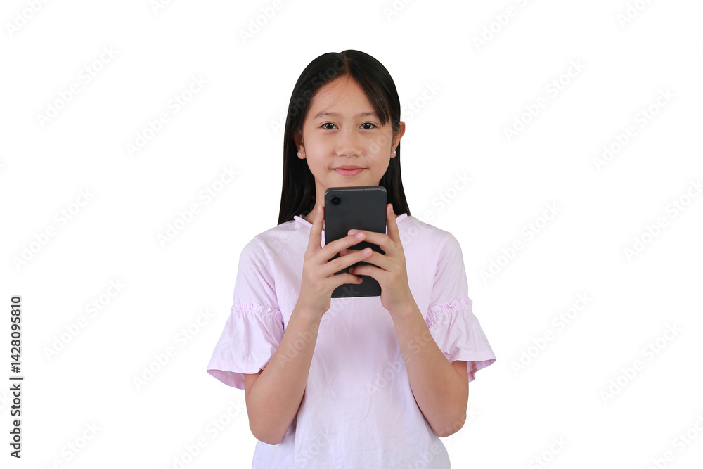 Asian pretty girl using smartphone on white background. Childhood and technology concept. Portrait of happy child using cell phone while looking camera. Asian pretty girl using smartphone on white background. Childhood and technology concept. Portrait of happy child using cell phone while looking camera.