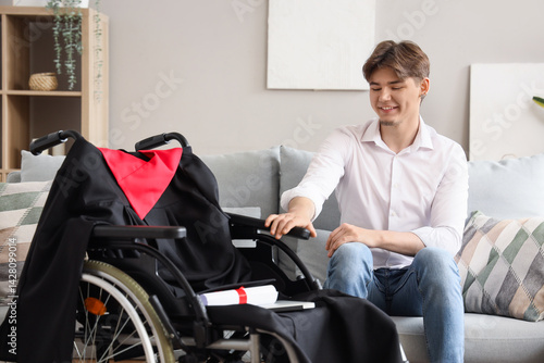 Male graduate with wheelcha...