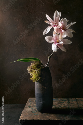 Elegant Magnolia Flowers In Dark Vase