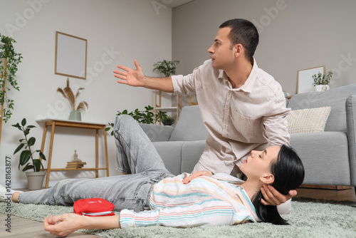 Young woman having heart at...