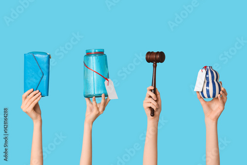 Female hands with auction g...