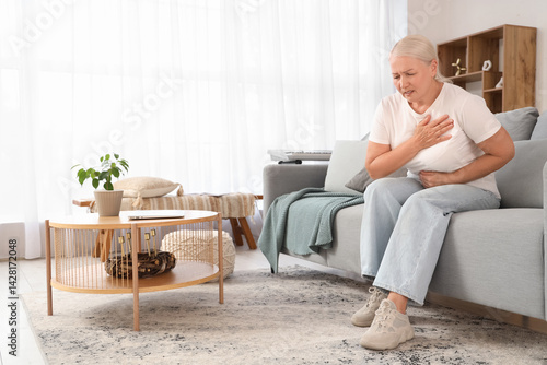 Mature woman having heart a...