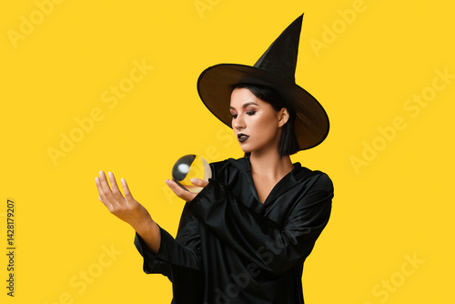 Beautiful young witch with ...