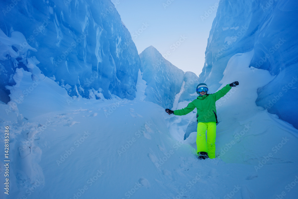 Vibrant ski gear contrasts against a breathtaking icy backdrop