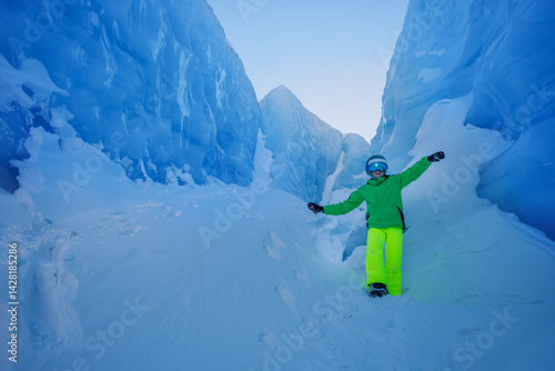 Vibrant ski gear contrasts against a breathtaking icy backdrop