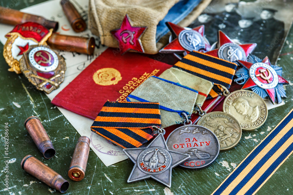 Fototapeta premium Orders and medals of the USSR.Awards of the Second world war close-up.Victory Day - 9 of may 1945. Soviet military awards.Phaleristics.Antikvariat.