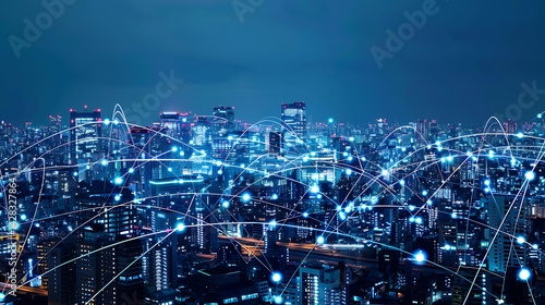 Wallpaper Mural Aerial view of a brightly illuminated city skyline at night overlaid with a glowing blue network grid representing connectivity. Smart city, data concept.
 Torontodigital.ca
