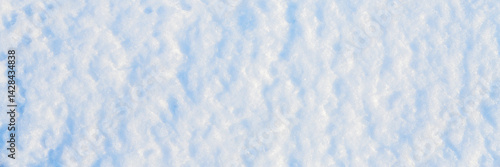 Obraz na płótnie Natural snow texture. The surface of the snow crust. Snowy ground. Winter background with snow patterns. Perfect for Christmas and New Year design. Closeup top view. w salonie