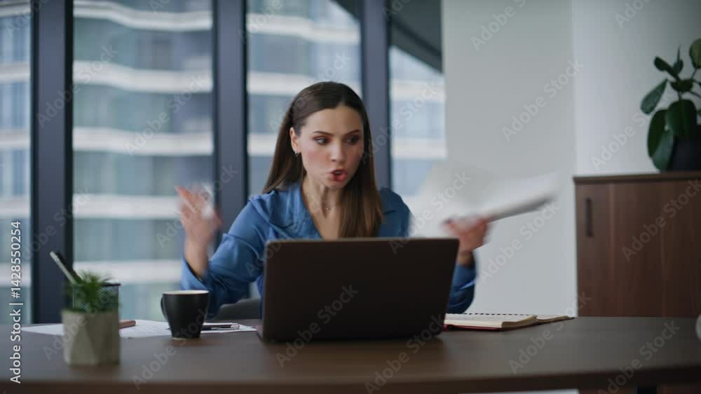 Furious woman quarrelling virtual meeting complaining on report in office. Furious woman quarrelling virtual meeting complaining on report in office.