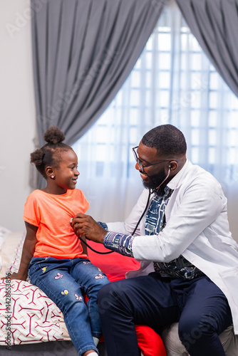 Εκτύπωση καμβά Paediatric care, An African male doctor examines a young African girl with a stethoscope, ensuring compassionate and thorough healthcare for children