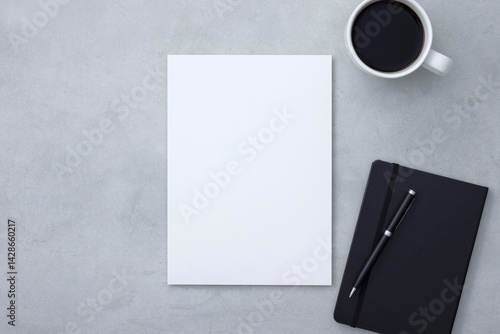 白い無地の紙のビジネスイメージ　A flat lay image of a blank white sheet of paper.