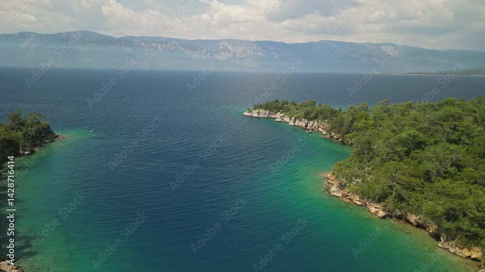 Aegean coastline along Karaca bay with green Turkish hills Aegean coastline along Karaca bay with green Turkish hills