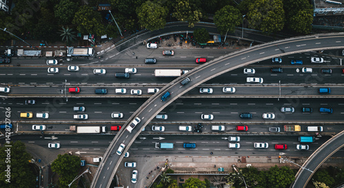 Wallpaper Mural Aerial view of a multi lane highway with many cars and trucks traveling in both directions in daylight Torontodigital.ca