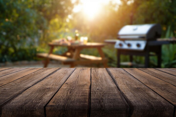Empty wooden table and backyard garden background with grill BBQ