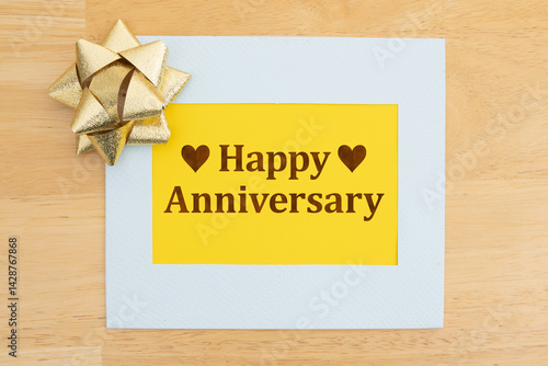 Obraz na płótnie Happy Anniversary greeting card with gold bow w salonie