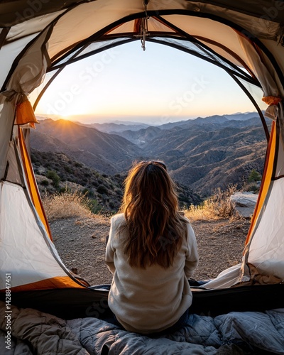 Obraz na płótnie Woman Enjoying Sunrise View from Tent in Mountain Landscape with Scenic Nature Background w salonie