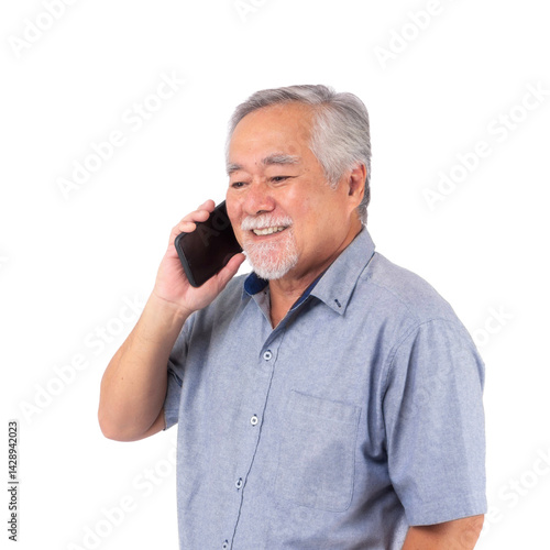 Happy senior Asian man talking on smartphone and smiling, wearing casual blue shirt, isolated on a transparent background, concept of modern elderly lifestyle, communication, and technology