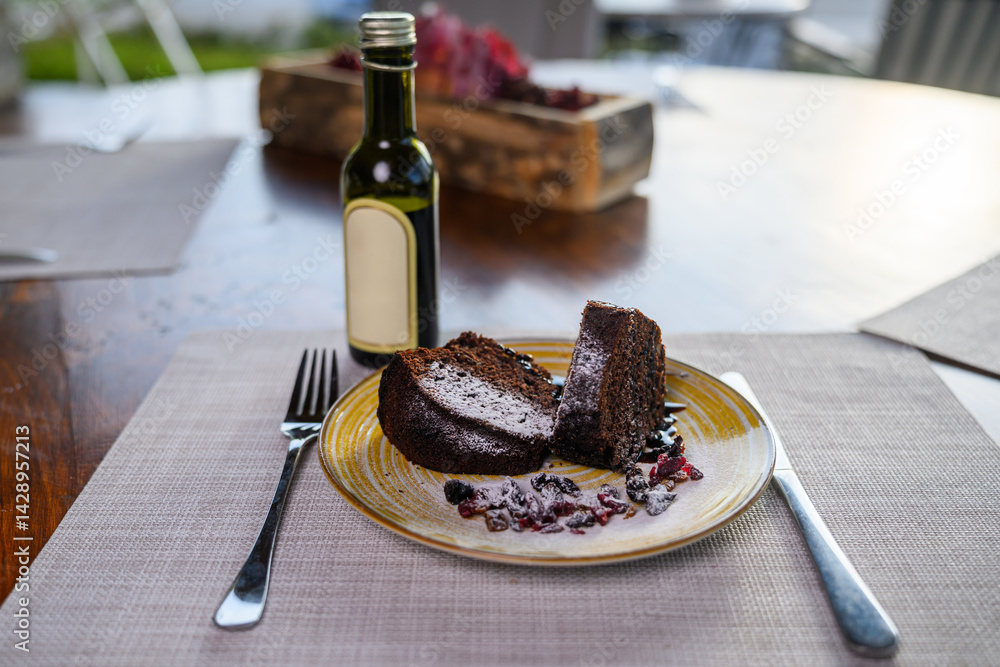 A Gugelhupf (Kuglof) is a cake traditionally baked in a distinctive ring pan, similar to Bundt cake, but leavened with baker's yeast.