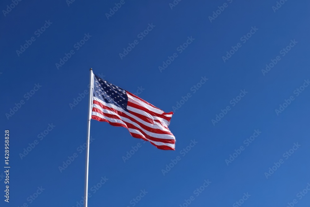 minimalistic image of single american flag fluttering in breeze against vibrant blue sky