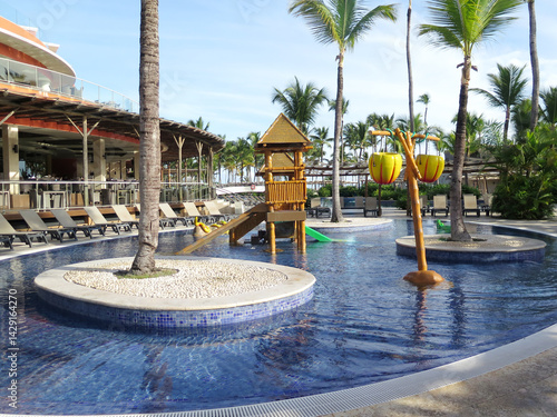 Tropical Resort Pool with Splash Buckets and Play Area