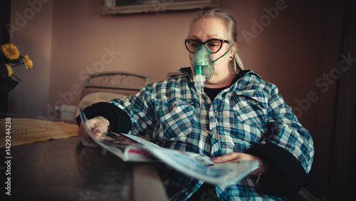 Asthma therapy – woman holding inhaler during breathing difficulty