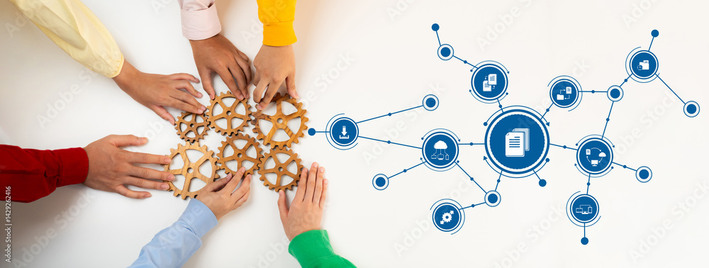 Obraz premium This image showcases a collaborative management approach with hands assembling gears, representing teamwork and digital connectivity in modern business operations. Amity