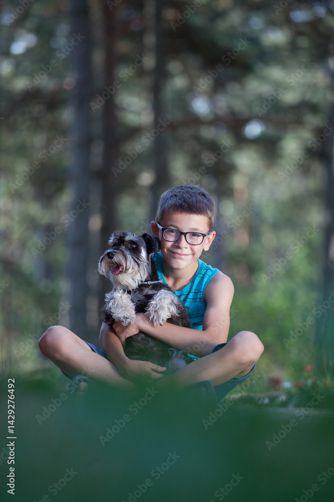 Obraz premium Kids and dogs having fun in nature