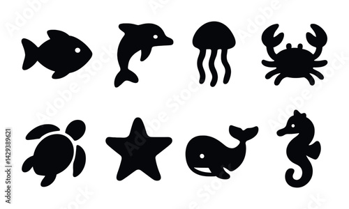 Marine life silhouette icons set – flat style ocean animals symbols for aquatic design: fish, dolphin, jellyfish, crab, turtle, starfish, whale, seahorse.