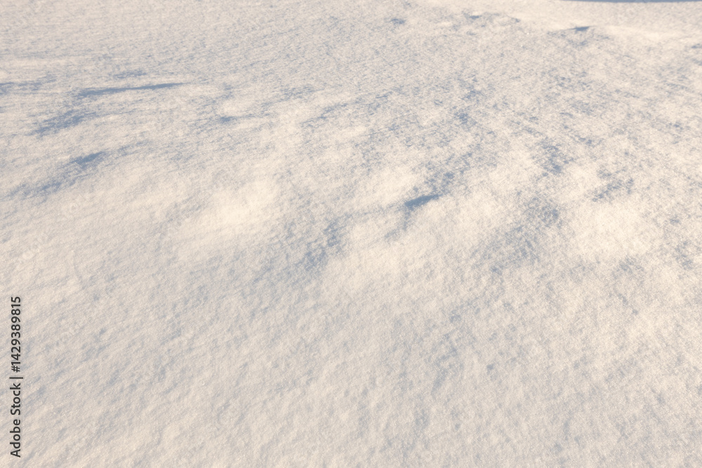 Natural snow texture, surface of clean fresh snow. Snowy ground. Winter background, Christmas and New Year design Natural snow texture, surface of clean fresh snow. Snowy ground. Winter background, Christmas and New Year design