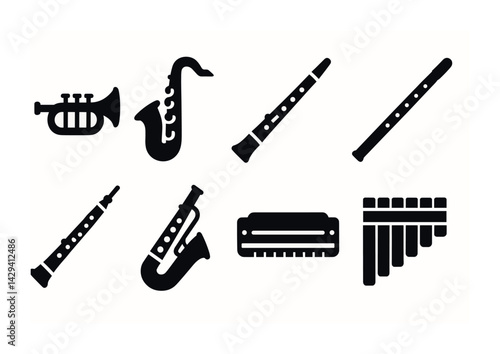 Musical instruments silhouette icons set – solid style orchestra, band, and music symbols for creative design: trumpet, saxophone, clarinet, flute, harmonica, pan flute, oboe.