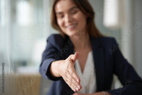 Obraz na płótnie businesswoman extending hand to shake hands with client, legal and financial assistance w salonie