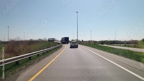 Car traffic driving on multiple lanes highway and interstate 315 and 270 belt outside Columbus, Ohio in midwest American roadway turnpike near northern city traffic by Worthington, OH