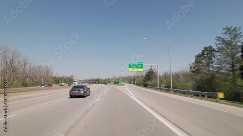 Car traffic driving on multiple lanes highway and interstate 315 and 270 belt outside Columbus, Ohio in midwest American roadway turnpike near northern city traffic by Worthington, OH