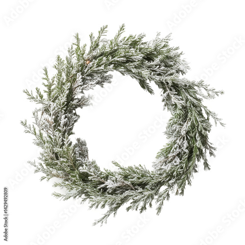 traditional christmas wreath hanging on white backdrop
