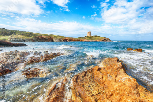 Obraz na płótnie Amazing morning view of Piscinni bay with turquoise sea and famous coastal tower of Piscinni w salonie