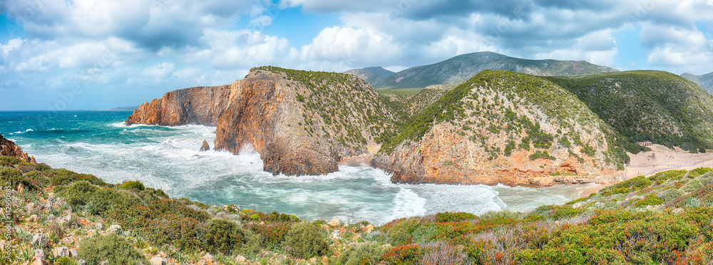 Attractive view of valley Cala Domestica with marvelous sand beach and storm on the sea.