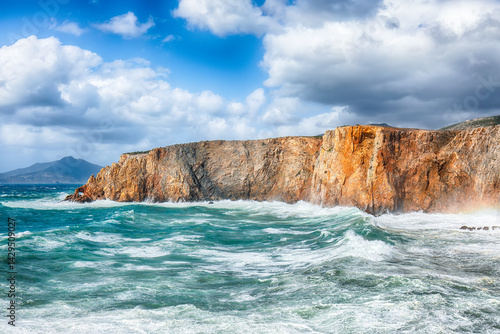 Obraz na płótnie Attractive view of cliffs in valley Cala Domestica and storm on the sea w salonie