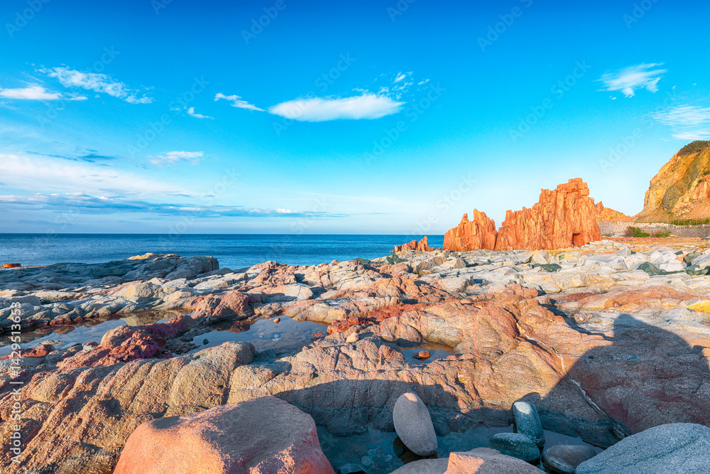 Exciting sunset view of Red Rocks (Rocce Rosse) in Arbatax.